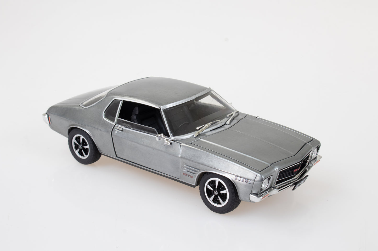 DDA208-R - 1:24 1972 Raw Steel Holden HQ Monaro
