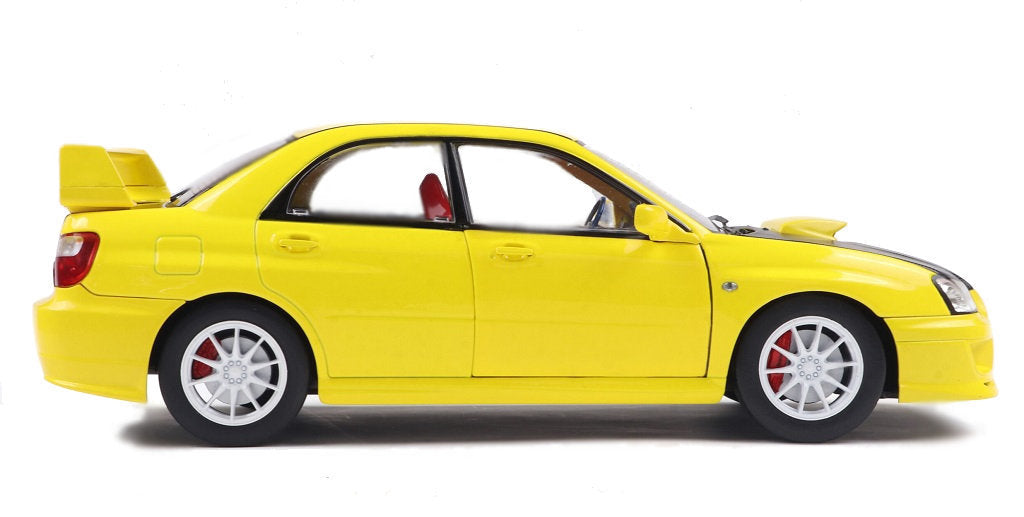 S1812302 - 1:18 Yellow Subaru Impreza